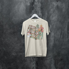 Load image into Gallery viewer, Vintage Cowboy Christmas Tee - Musical Holiday Shirt - Retro Xmas Graphic T-Shirt
